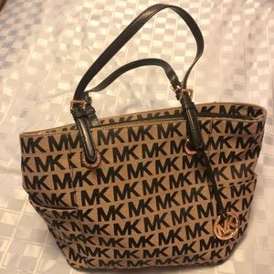 Michael Kors purse used  in good condition.